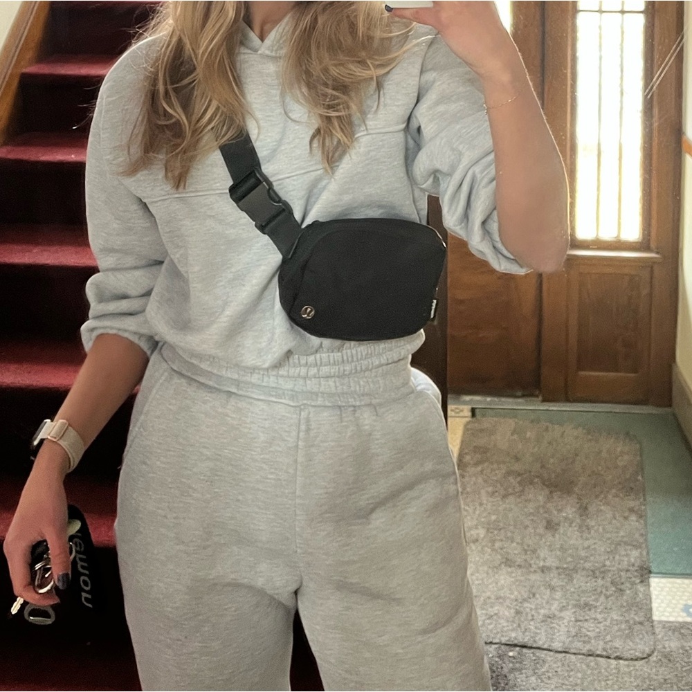 Grey cropped sweatshirt.